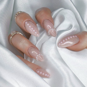 10 Pearl-Adorned Nail Ideas To Bring Timeless Glamour Your